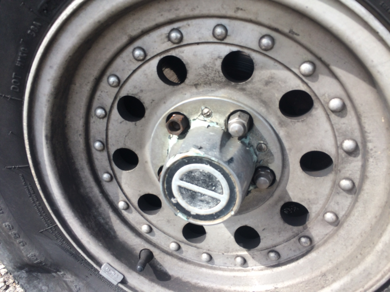 4 o’clock lug nut cap was stripped so I had to remove trim cap